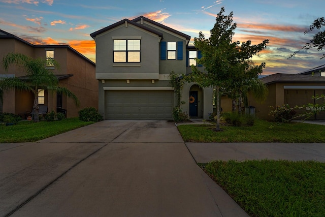 view of front of property featuring a garage