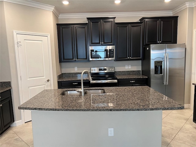 kitchen with a center island with sink, ornamental molding, sink, and stainless steel appliances