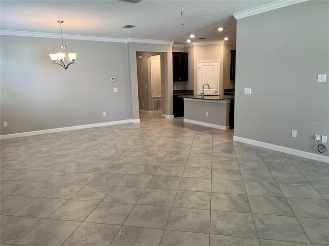 unfurnished living room with a notable chandelier and crown molding