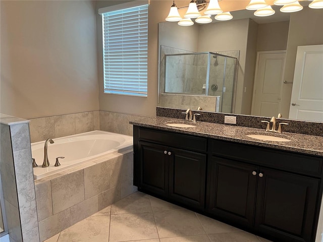 bathroom with vanity, plus walk in shower, and tile patterned floors