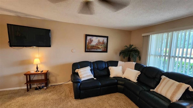 carpeted living room featuring a textured ceiling