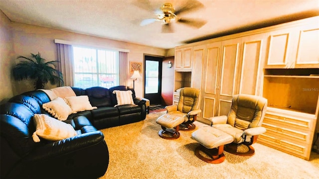 living room with carpet flooring and ceiling fan