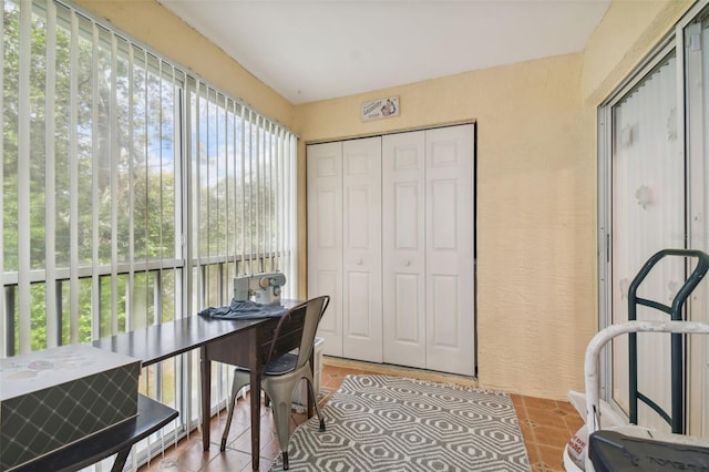 home office with light tile patterned floors