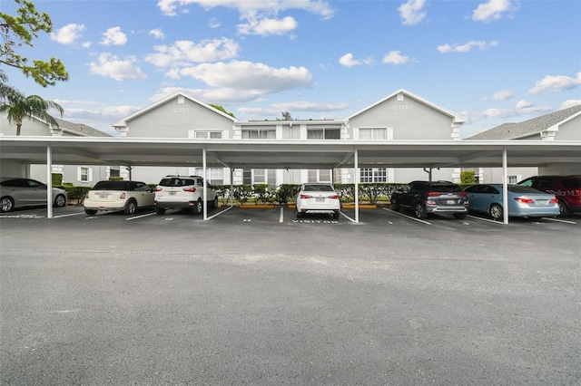 view of car parking with a carport