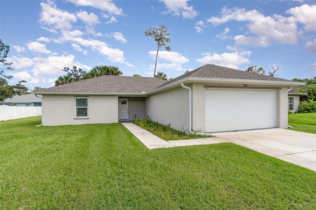 ranch-style home with a front yard and a garage