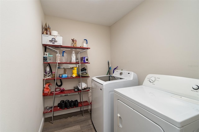 washroom featuring light wood-type flooring and washing machine and dryer