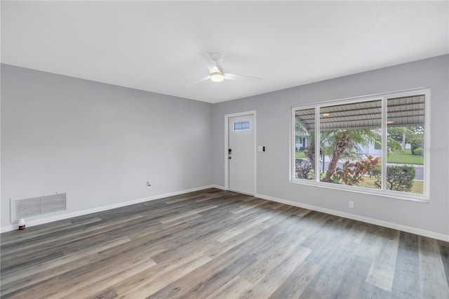 interior space with ceiling fan and hardwood / wood-style floors