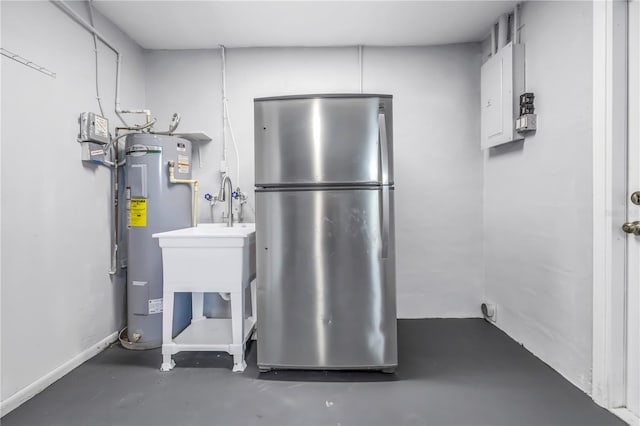 utility room featuring electric panel and water heater