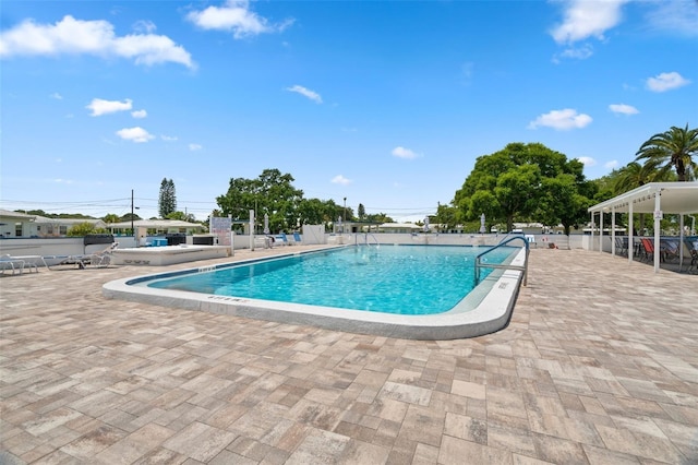 view of pool featuring a patio