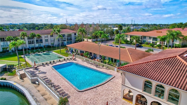 view of swimming pool with a patio