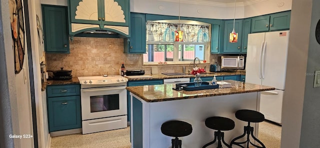 kitchen featuring decorative backsplash, white appliances, a center island, and ornamental molding