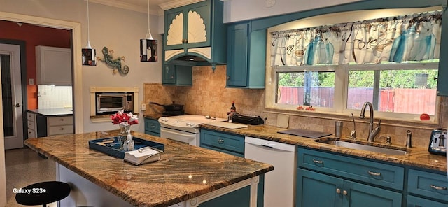 kitchen with dark stone counters, white appliances, and sink