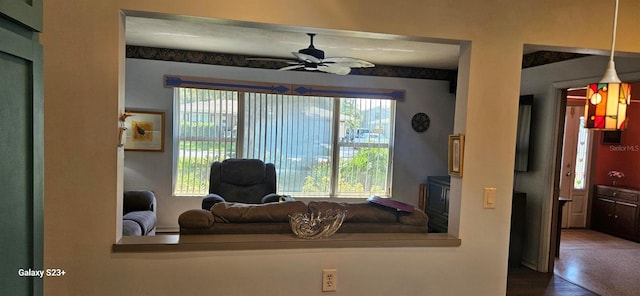 living room with ceiling fan