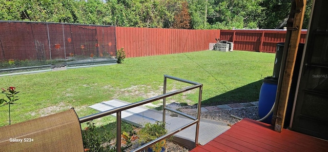 view of yard featuring a wooden deck