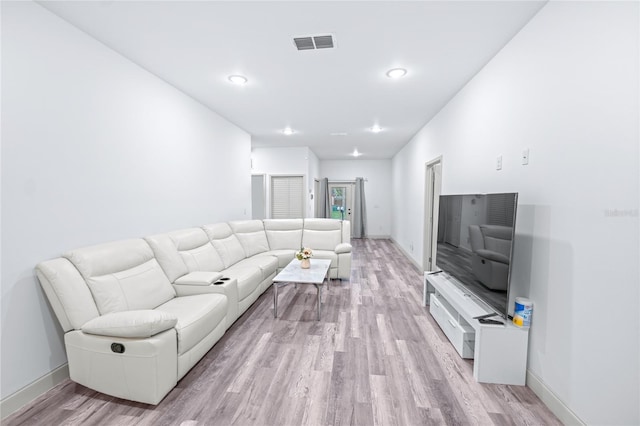 living room featuring light wood-type flooring