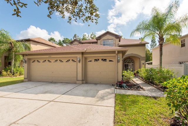 view of front of property with a garage