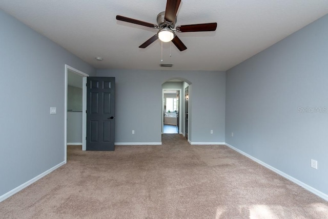 interior space featuring ceiling fan