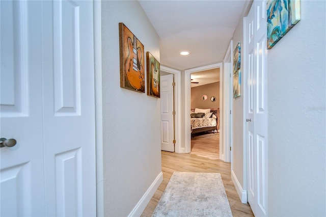 corridor featuring light hardwood / wood-style flooring