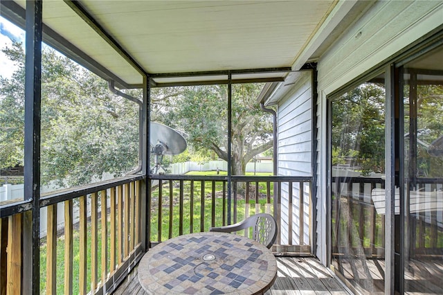 unfurnished sunroom featuring a healthy amount of sunlight