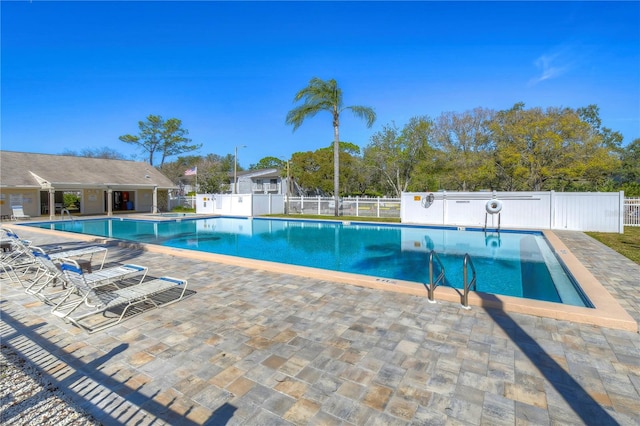 view of pool featuring a patio area