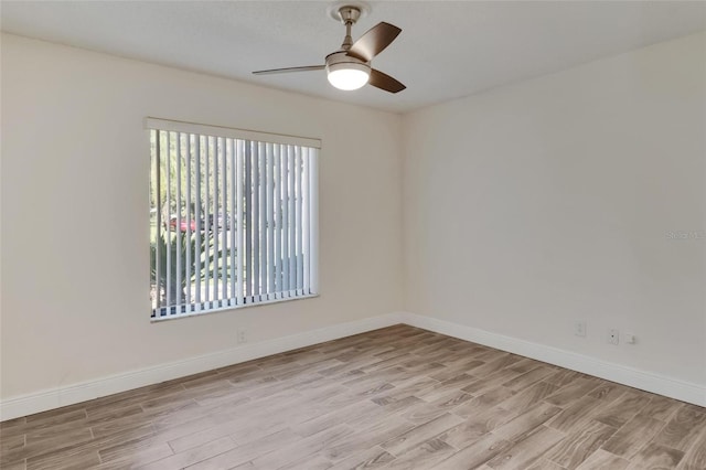 unfurnished room with ceiling fan and light hardwood / wood-style floors