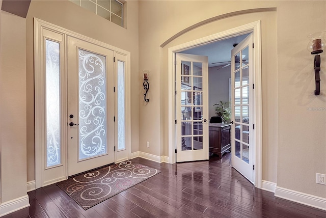 entrance foyer featuring french doors and dark wood-type flooring