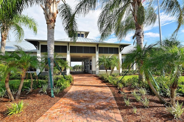 exterior space with a carport