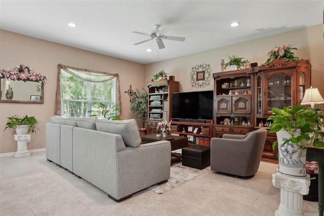 living room featuring ceiling fan