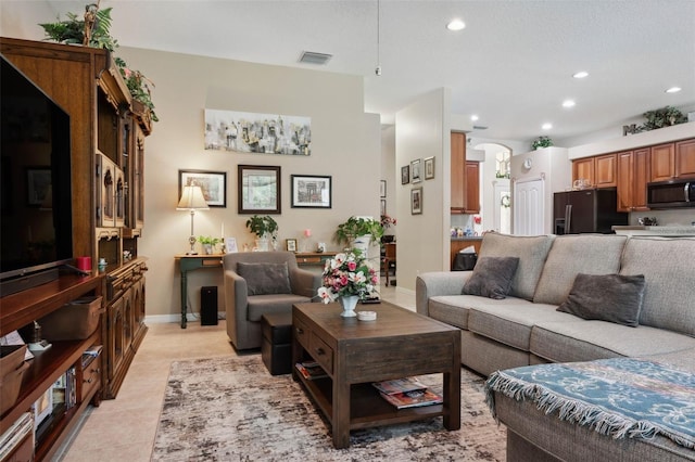 living room featuring light tile patterned floors