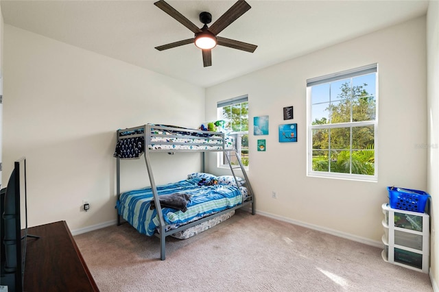 bedroom featuring carpet floors and ceiling fan