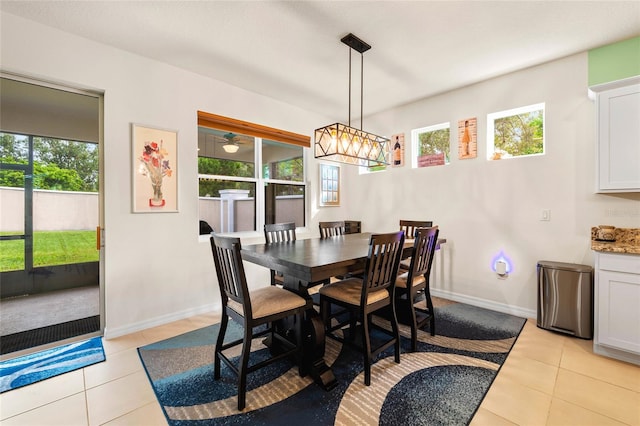 tiled dining space with a wealth of natural light