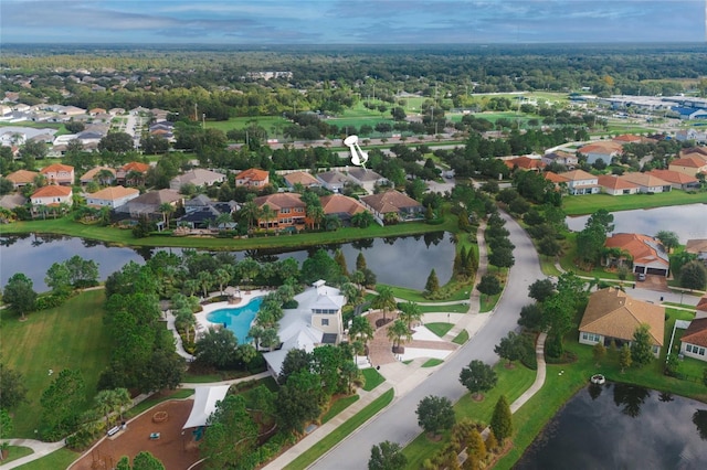 11892 Frost Aster Dr, Riverview, FL 33579 - aerial view of residential area featuring a large body of water and a pool area