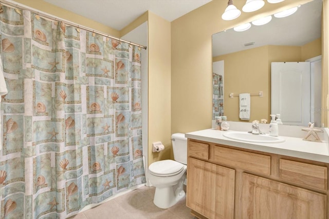 bathroom with tile patterned floors, vanity, toilet, and a shower with shower curtain