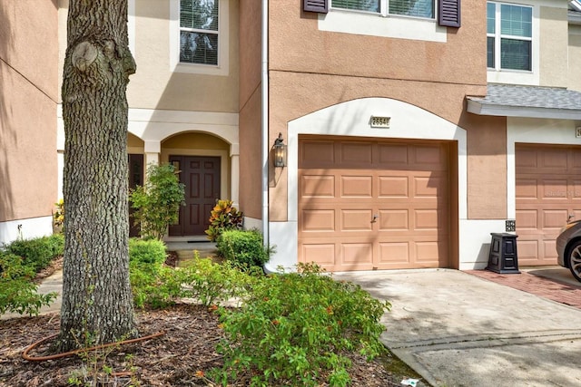 property entrance featuring a garage