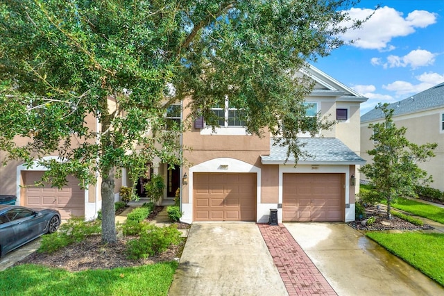 view of front of property with a garage