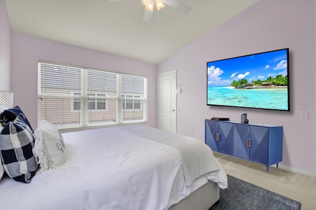 carpeted bedroom with ceiling fan and lofted ceiling