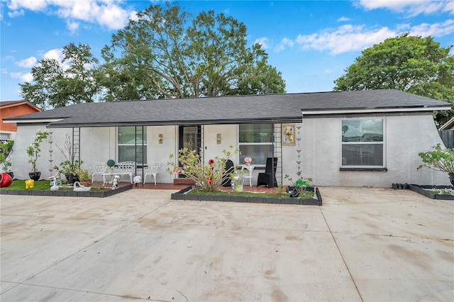 single story home with a patio area