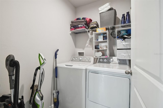 laundry area featuring washing machine and dryer