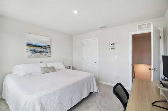 bedroom with light carpet