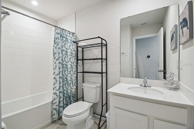 full bathroom featuring toilet, vanity, and shower / bath combo with shower curtain