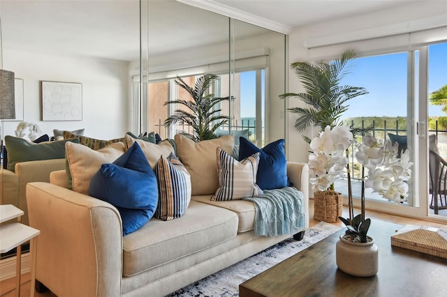 living room with plenty of natural light and hardwood / wood-style flooring