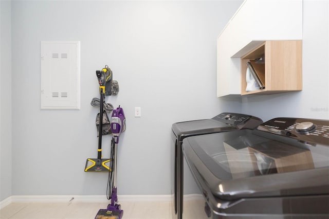 laundry area with washing machine and dryer