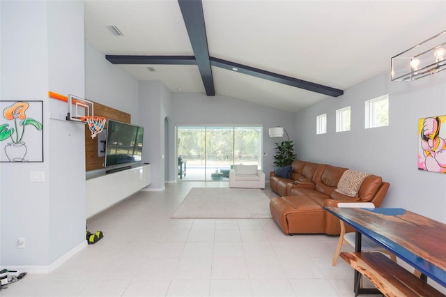 living room featuring an inviting chandelier and lofted ceiling with beams