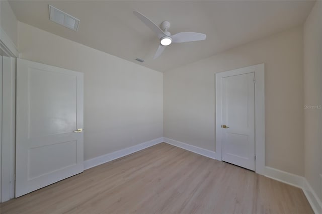 unfurnished room with light hardwood / wood-style floors and ceiling fan