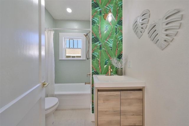 full bathroom featuring toilet, shower / bath combo, vanity, and tile patterned floors