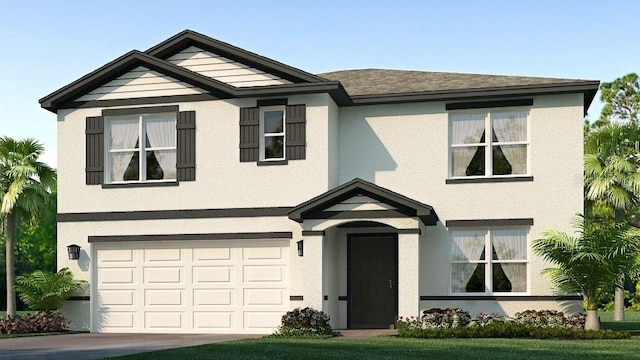 view of front of property with a garage and a front lawn