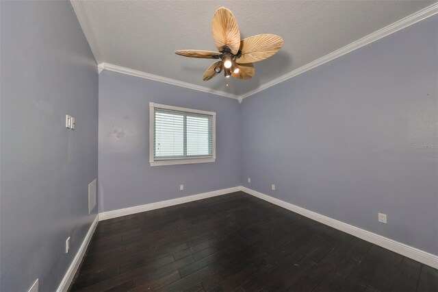 empty room featuring a textured ceiling, ornamental molding, hardwood / wood-style floors, and ceiling fan