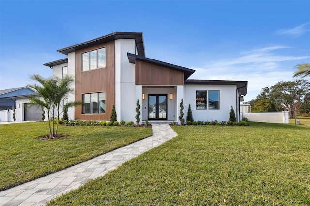 contemporary home with a front yard