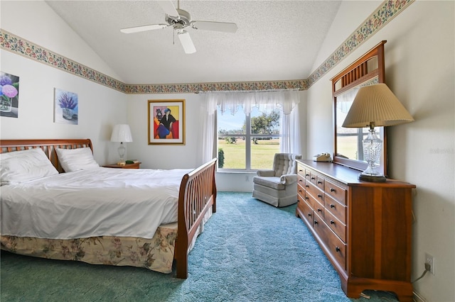 bedroom featuring carpet, ceiling fan, lofted ceiling, and a textured ceiling