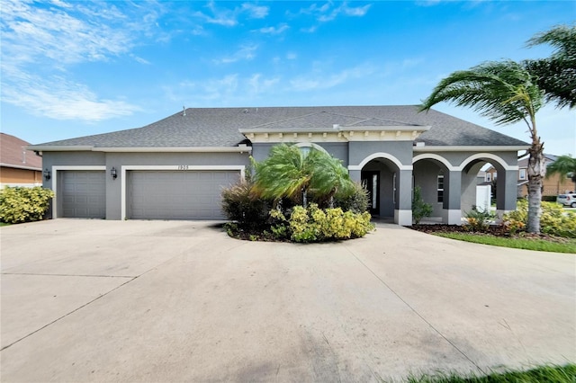 view of front of property featuring a garage